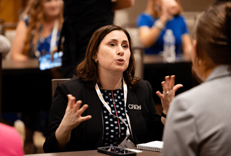 CREW member speaking with hands